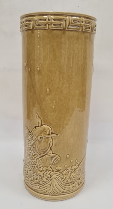 Late Victorian majolica glazed stick stand, cylindrical with key border and decorated in relief with