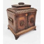 Unusual box / compendium covered in leather, the lid of pagoda form above two doors enclosing