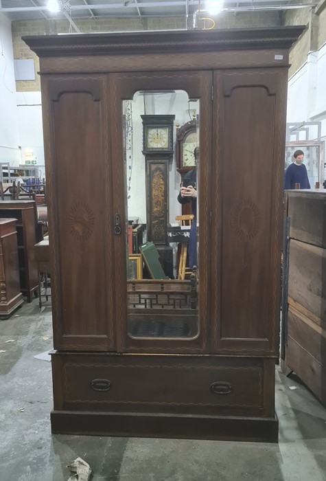 Late 19th/early 20th century single mirrored door wardrobe with cavetto moulded cornice, inlaid