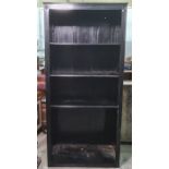 Dark stained open bookcase with fluted decoration to pillasters, on plinth base, 97.5cm x 208cm