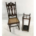 Cane seated oak-framed chair and a stickstand (2)