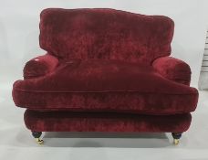 Modern lover's chair and pouffe in plum coloured upholstery  Condition ReportThe dimensions to