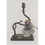 Ceramic monkey and metal table lamp, the monkey seated beside twisted branch on metal base, 19cm x