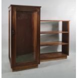 Modern display cabinet with single glazed door, on plinth base with attached bookshelf