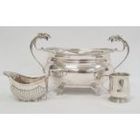 1920's two-handled sugar bowl, mask handles, pierced decoration to corners, on claw feet, Birmingham