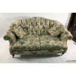 Lincoln House two-seat sofa, two armchairs and pouffe in cream ground foliate patterned