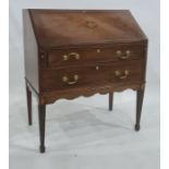 Early 20th century mahogany bureau with two drawers, on square section tapering supports to spade