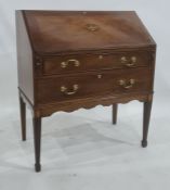 Early 20th century mahogany bureau with two drawers, on square section tapering supports to spade