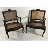 Two similar of possibly 18th century cane seated and backed low armchairs on cabriole legs (2) ***