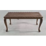 Eastern-style rectangular coffee table with carved leaf decoration, raised on cabriole legs, 19.