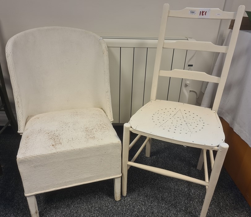 White painted chair with pierced seat and one further white chair (2)