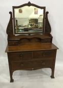 Early 20th century oak dressing chest with mirrored superstructure above two short and one long