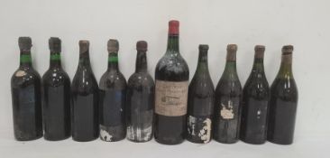 Magnum bottle of 1966 Chateau Haut-Marbuzet, three bottles of 1970 vintage (no labels) and six