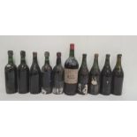 Magnum bottle of 1966 Chateau Haut-Marbuzet, three bottles of 1970 vintage (no labels) and six