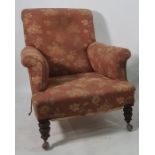 19th century armchair in foliate upholstery, on turned supports to castors  Condition ReportThe
