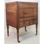 19th century mahogany folding washstand/dressing table, the rectangular top opening to reveal