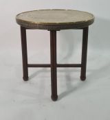 Eastern brass-topped circular table, the brass top with decorative engraving, on reeded base