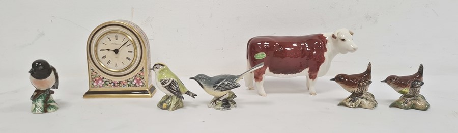 Beswick model cow "CH. of Champions", five Beswick model birds and a Wedgwood Cleo pattern clock (