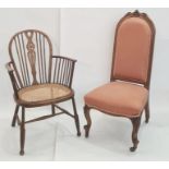 Late Victorian chair with carved top rail, upholstered seat and back, cabriole legs terminating to