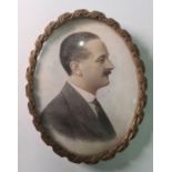 Early 20th century school Watercolour miniature Head and shoulders portrait of a gentleman in a