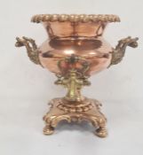 Large Victorian copper and brass two-handled hot water urn with gadrooned border, scroll handles,
