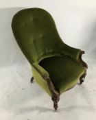 Early Victorian armchair with green upholstered seat and back, carved exposed arms and cabriole legs