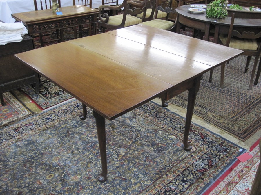Antique mahogany drop-leaf rectangular dining table, on turned support and  pad feet