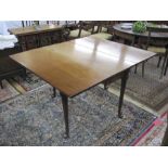 Antique mahogany drop-leaf rectangular dining table, on turned support and  pad feet