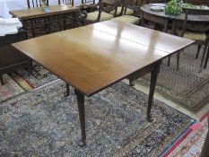 Antique mahogany drop-leaf rectangular dining table, on turned support and  pad feet