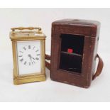 Brass and glass carriage clock with Roman numerals to the dial, in carry case  Condition