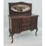 20th century sideboard with oval mirrored back above two central drawers and two cupboard doors,