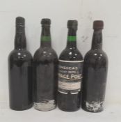 Bottle of Fonseca's Finest 1970 vintage port by Quellyn Roberts & Co, Chester and three similar