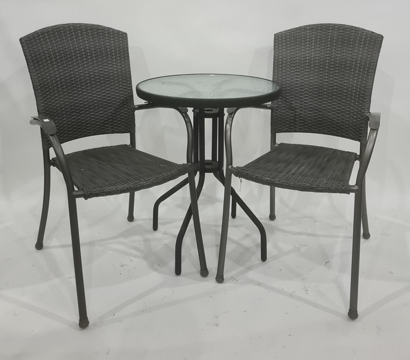 Circular glass topped garden table and two chairs (3)