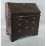 18th century oak bureau bookcase with cavetto moulded cornice above two panelled doors enclosing