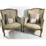 Pair 19th century style wing back chairs in the French taste, French linen upholstered seat and