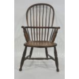 Late 19th/early 20th century elm seated stickback Windsor elbow chair on turned supports and