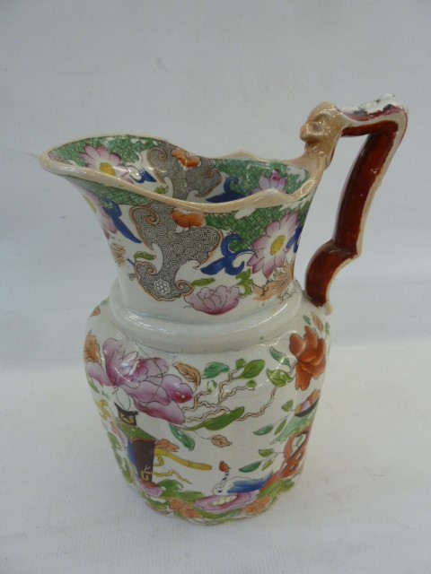 19th century Masons ironstone jug, the handle with mask decoration, the body foliate decorated in