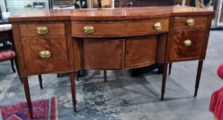 19th century mahogany breakfront sideboard with assorted drawers and cupboard doors, on turned and