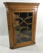 Pine corner cupboard the astragal glazed door enclosing shelves, 101.5 high