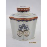 Chinese porcelain tea canister and cover with ogee moulded sides, floral spray decorated and with