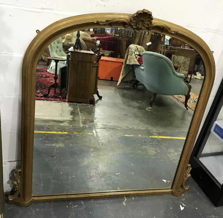 Arch-top overmantel mirror in moulded gilt-effect frame, 130 x 123cm