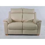 Parker Knoll cream leather two-seat sofa