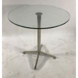 Circular glass-topped centre table on chrome style base, diameter 70cm