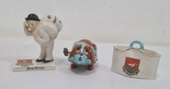 Vintage Japanese wind-up tinplate toy by Yone of a puppy, a Carlton china crested ware figure