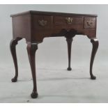 18th century oak lowboy of three drawers, the rectangular top with moulded edge, raised on