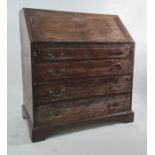 19th century oak bureau on four long drawers, bracket feet, 93.5cm x 103cm