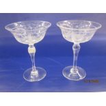 Pair of Walsh Walsh early 20th century large champagne coupes with engraved garland decoration on