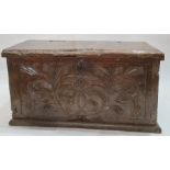 Antique carved oak coffer, the front panel with foliate scroll and all on plinth base, 91cm wide (
