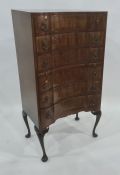 20th century mahogany serpentine front bedroom chest of six drawers with brushing slide, raised on