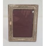 Late 20th century rectangular silver-mounted picture frame, frame with repousse decoration,